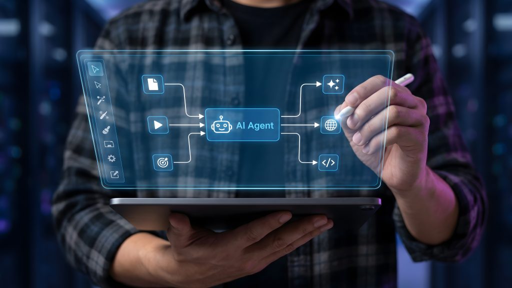 Artificial intelligence automation and AI agent workflow concept with person using digital tablet to design process diagram, symbolizing machine learning, innovation, and smart technology.