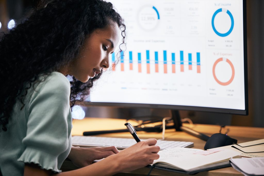 focused-woman-analyzing-financial-data-in-the-offi-2026-03-25-04-02-48-utc