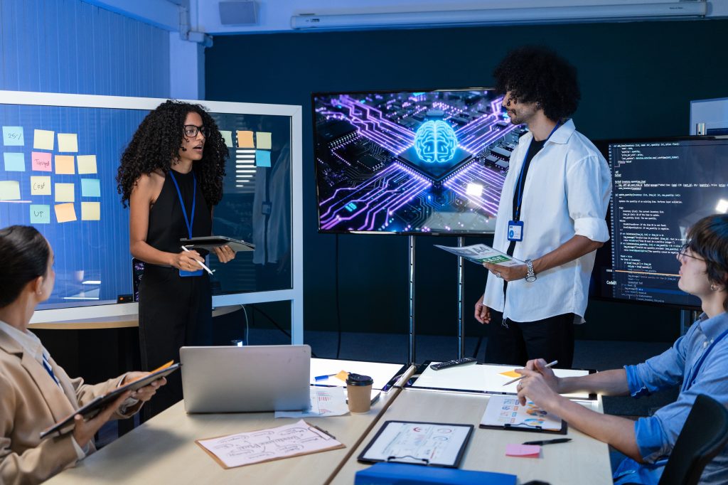 Female project manager sharing AI idea to team at the meeting
