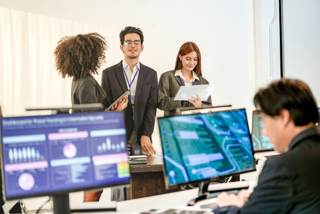 Multiethnic AI security squad analyzing threat intelligence in a