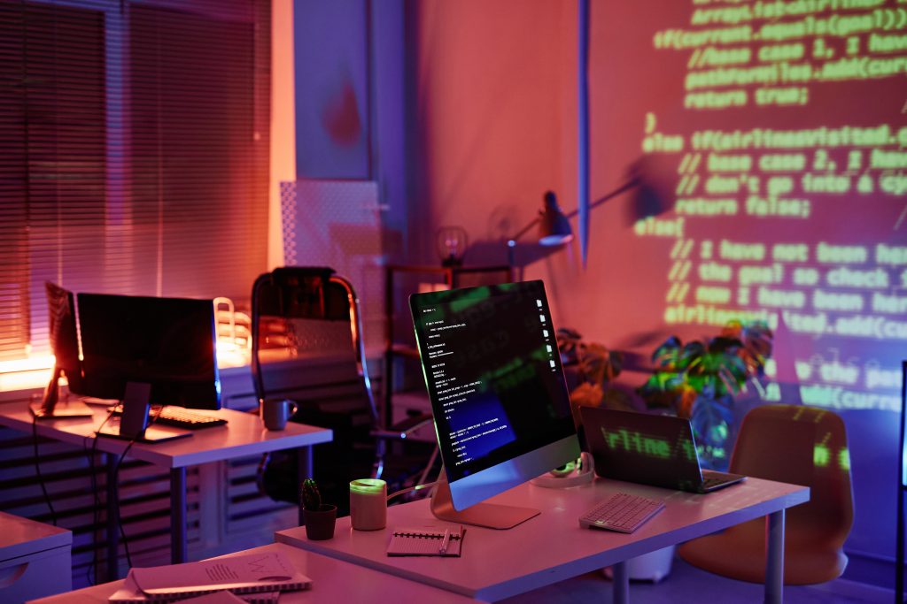 Abandoned openspace office with computer monitors on desks